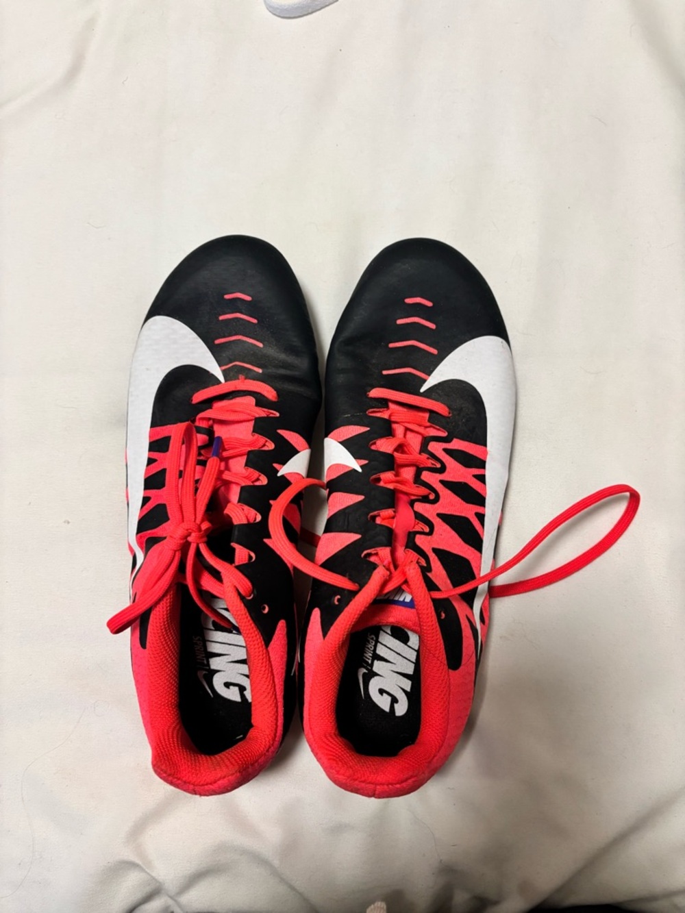 Nike Black and Bright Red Track Cleats
